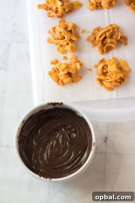 Melting chocolate in a bowl, a key step for drizzling over the Frito Candy recipe to create a delicious and visually appealing Christmas treat.