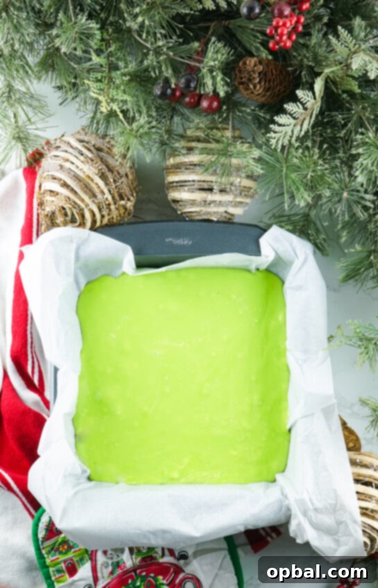 Grinch Fudge setting in a baking pan.