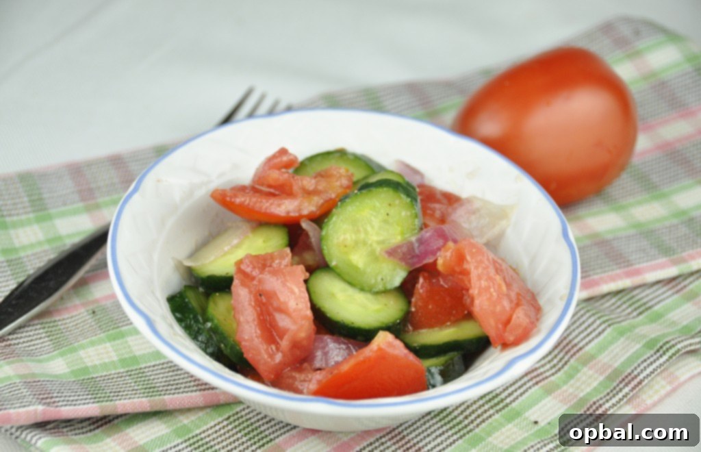 Refreshing Tomato, Onion, and Cucumber Salad, inspired by Rachael Ray.