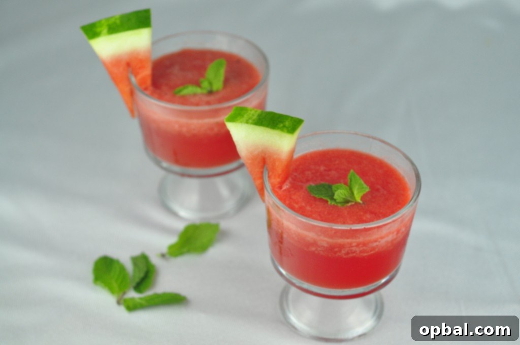 Cooling Watermelon Lemon Cooler with fresh mint sprigs.