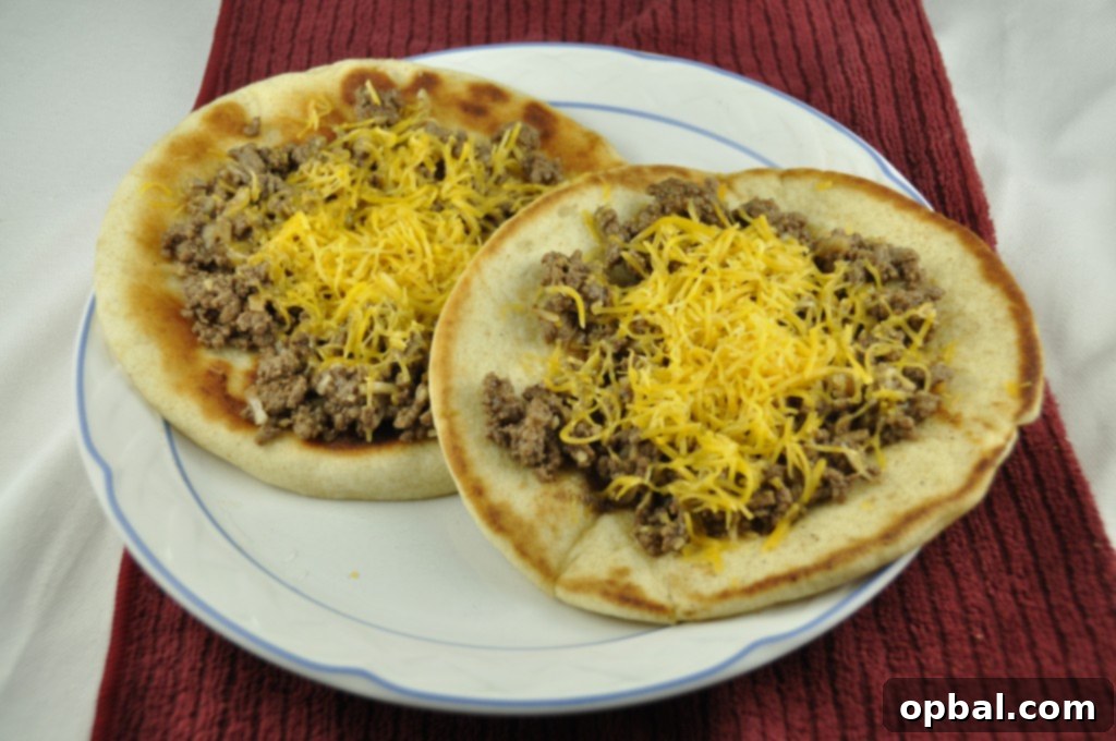 Delicious Cheeseburger Flatbread Melts, a fun twist on sloppy joes.