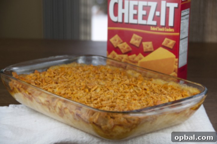 Delicious Cheez-It Macaroni and Cheese, featuring a golden, crunchy topping instead of traditional breadcrumbs. An easy and comforting dinner, lunch, or potluck idea.