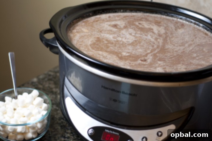 Velvet Crock-Pot Hot Cocoa 3 Creamy Crock Pot Hot Chocolate Recipe (Slow Cooker). For parties, holidays, pot lucks, cold winter days.