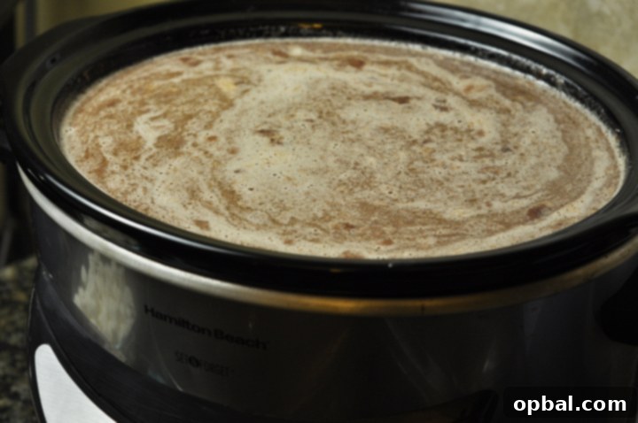 Velvet Crock-Pot Hot Cocoa 4 Creamy Crock Pot Hot Chocolate Recipe (Slow Cooker). For parties, holidays, pot lucks, cold winter days.