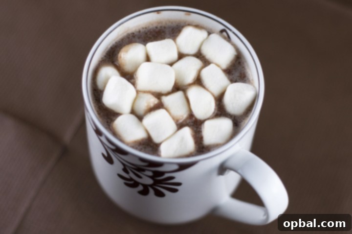 Velvet Crock-Pot Hot Cocoa 5 Creamy Crock Pot Hot Chocolate Recipe (Slow Cooker). For parties, holidays, pot lucks, cold winter days.