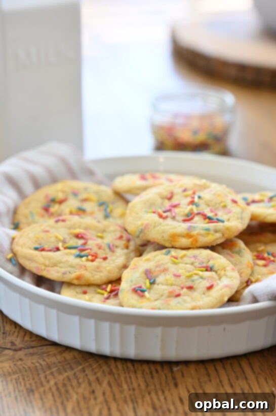 A close-up of Soft Sprinkle Sugar Cookies, showcasing their texture, colors, and appeal, perfect for Christmas or Valentine's Day.