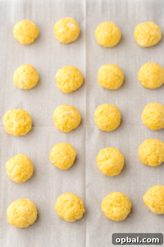Lemon Pompom Truffles 4 Forming the cake balls for the Ingredients needed to make the bunny butt lemon truffles recipe for Easter.