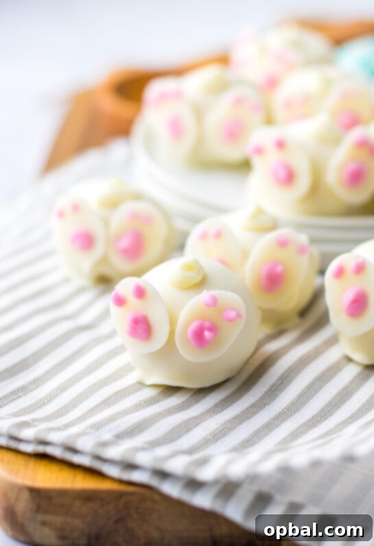 Lemon Pompom Truffles 7 These Bunny Butt Lemon Truffles are irresistibly cute, simple, and fun to make. A creamy blend of lemon Oreos and cream cheese forms the rich filling, which is then dipped in white chocolate and topped with a piped bunny tail. Homemade white‑chocolate bunny feet complete the look. They’re a guaranteed crowd‑pleaser—and a perfect no‑bake treat for Easter.