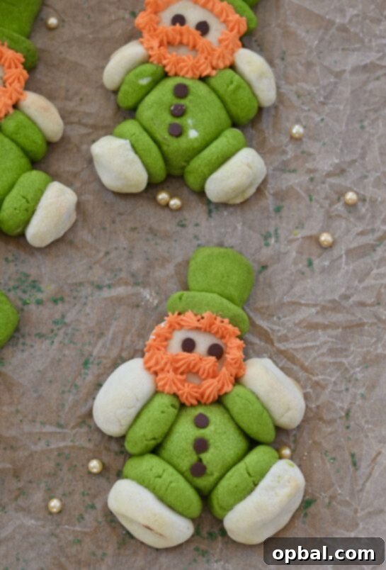 Leprechaun's Lucky Cookie Delights 7 A captivating close-up photo of a finished Lucky Leprechaun Cookie, emphasizing its adorable details like the mini chocolate chip eyes and fluffy orange beard for St. Patrick's Day.